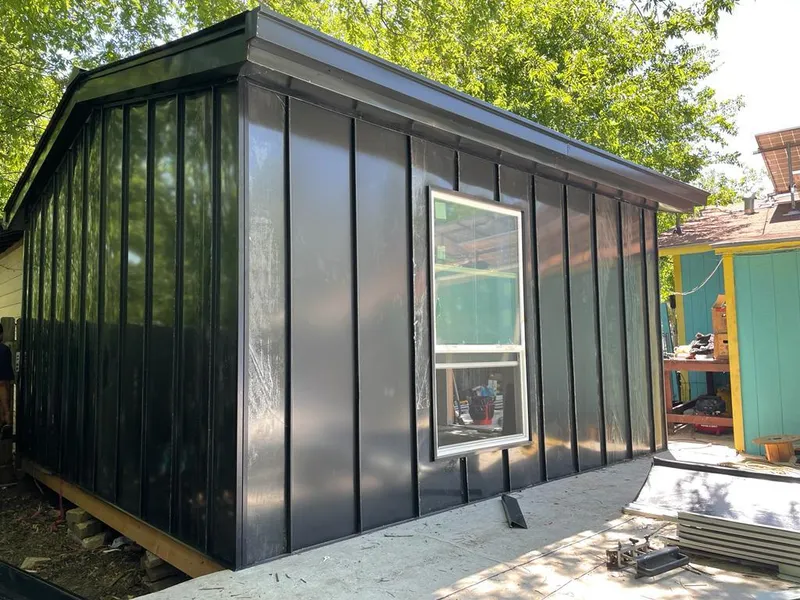 Black standing seam metal wall panels for Metal Roof Installation in Island Park