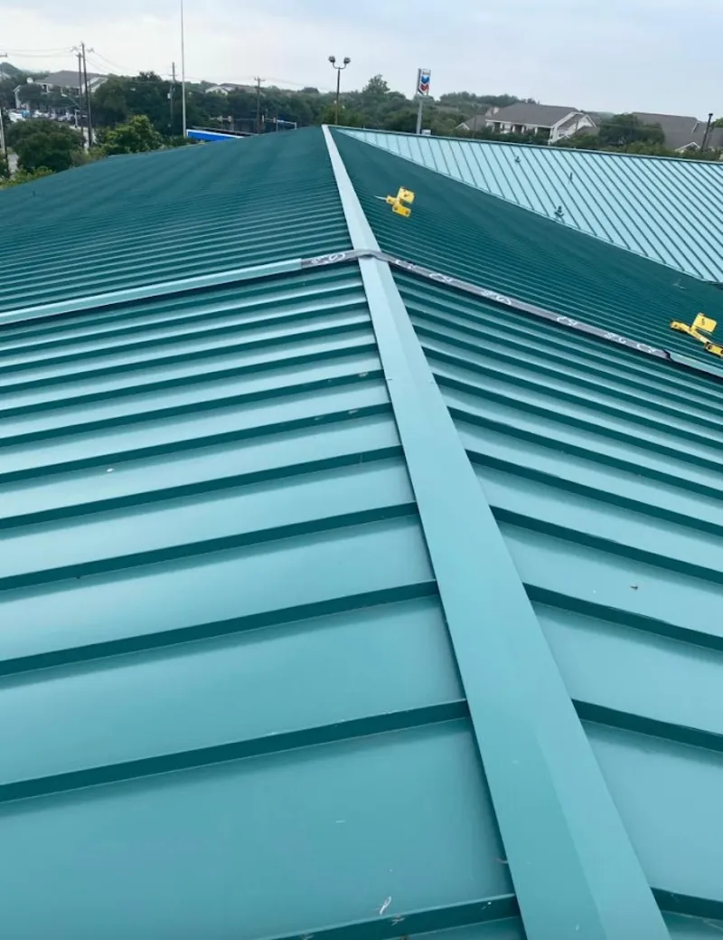 Green commercial metal roof ridge and valley for Metal Roof Repair in Island Park